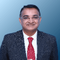 Dr Tejas Karmata
